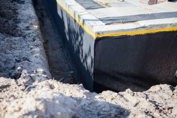 Professional Exterior Waterproofing technician working in Bridgman, MI